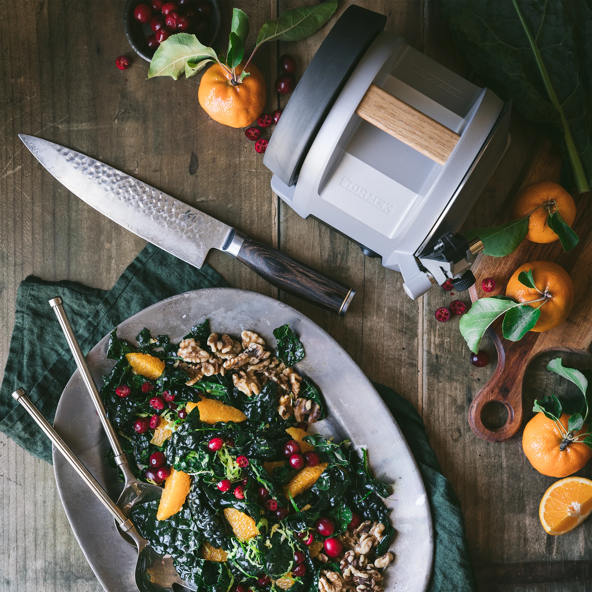 Tormek T-1 Zinc Gray from above next to a christmas themed salad