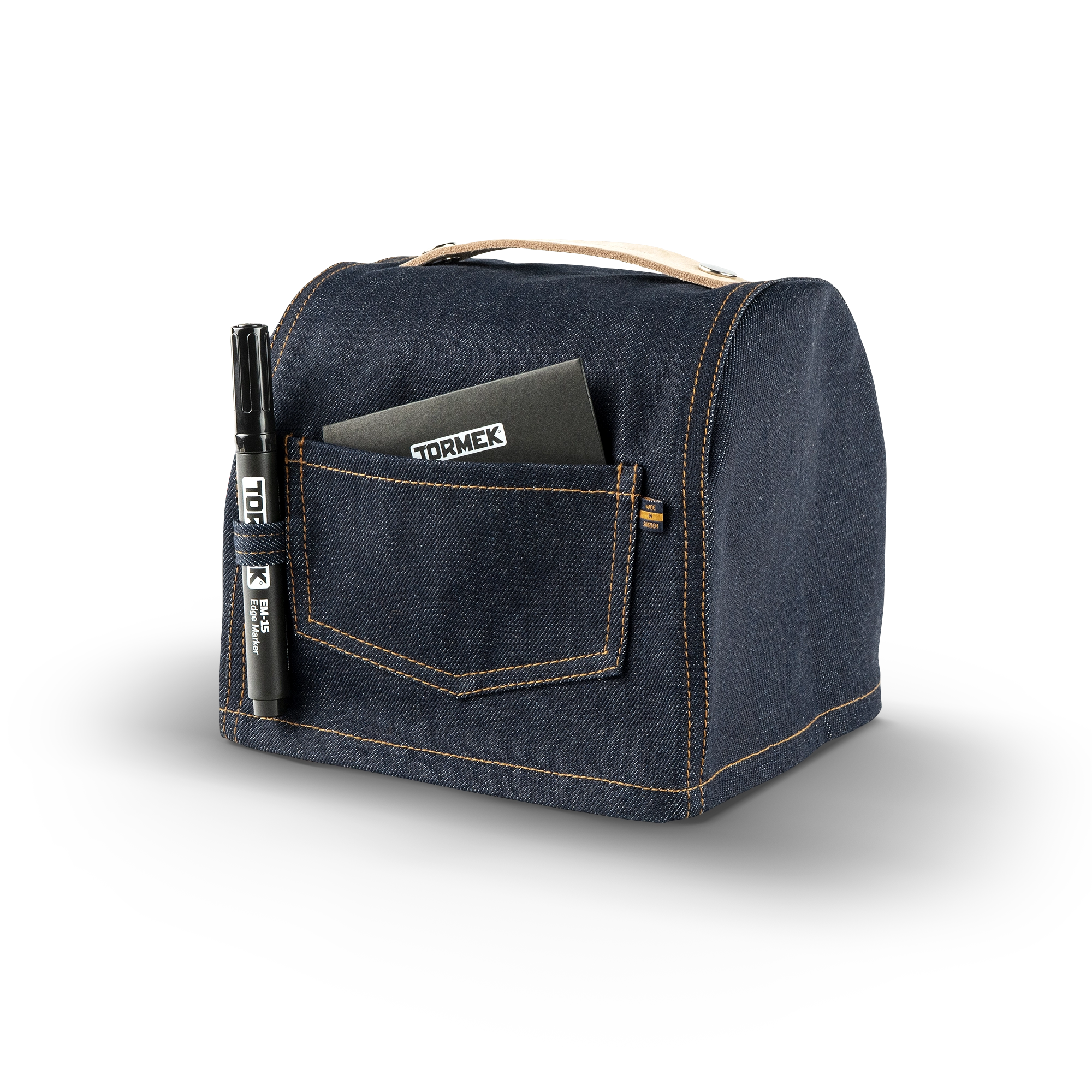 Cover for Tormek T-1 in denim by Jeansverket with edge marker and adhesive bandages