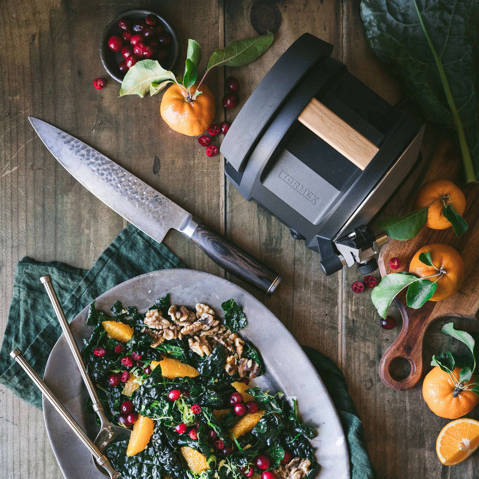 Tormek T-1 Carbon Black next to a christmas themed salad